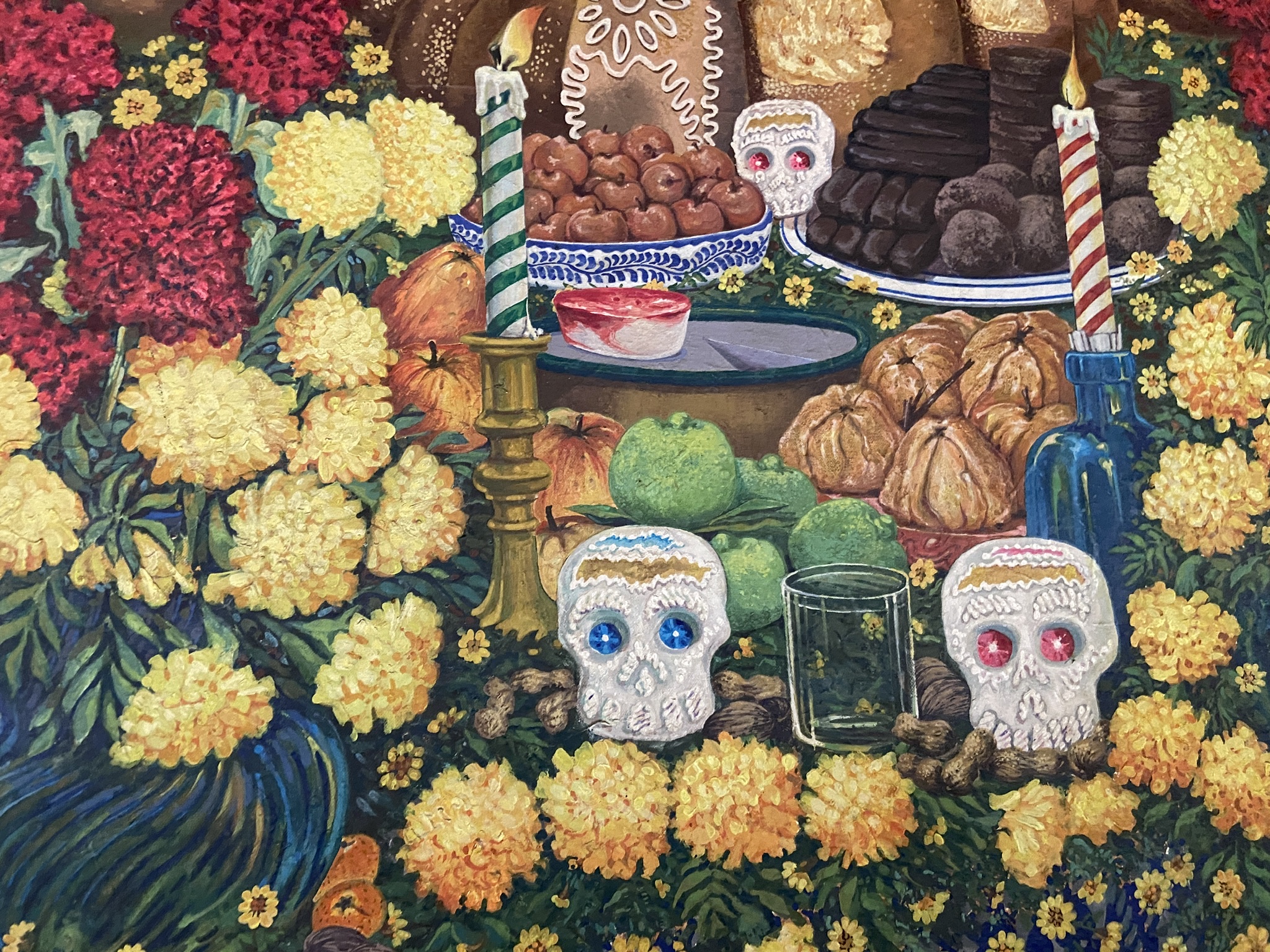 Óleo de una ofrenda de día de muertos con cempasúchil, pan, calaveritas y velas